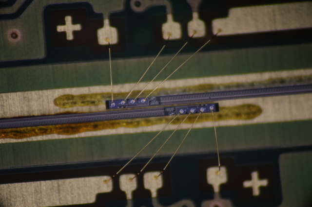 PCB with wirebonded dies on it. The dies are pretty long and thin.